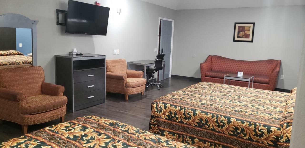 Camelot Inn & Suites Хьюстон Экстерьер фото