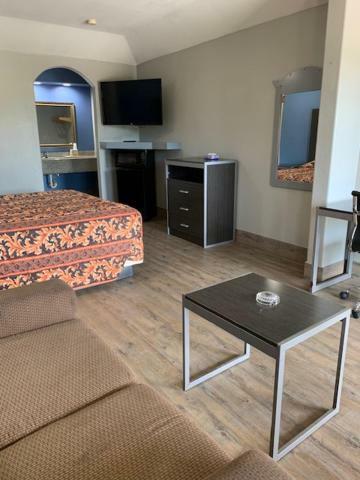 Camelot Inn & Suites Хьюстон Экстерьер фото