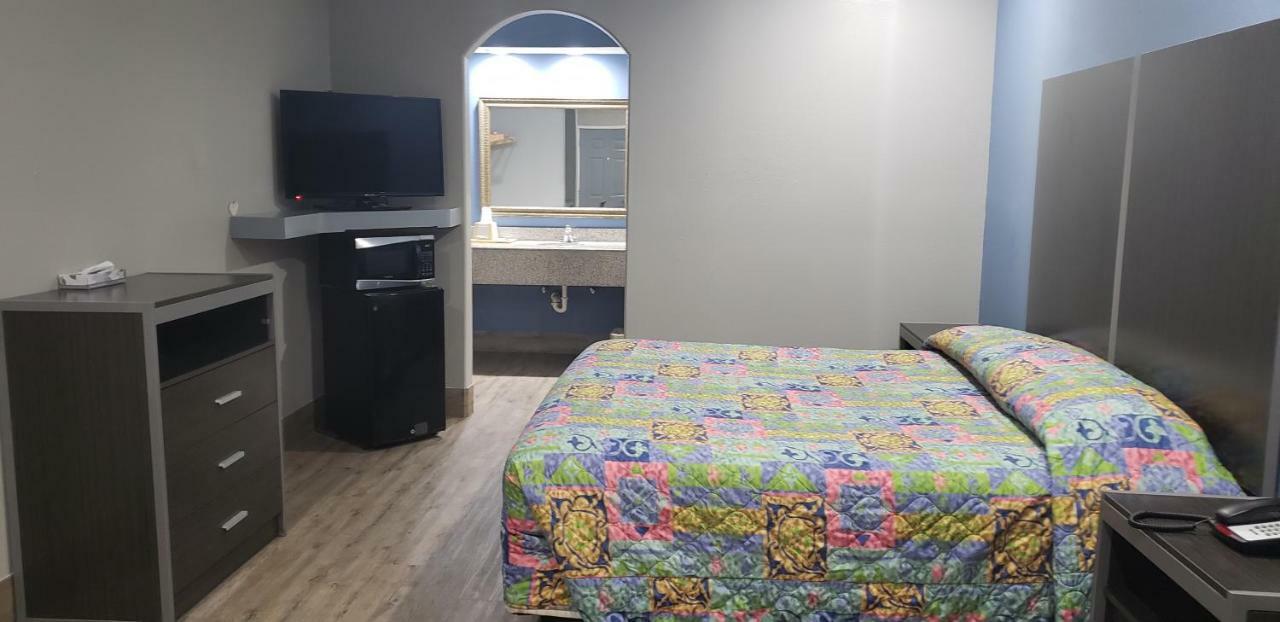 Camelot Inn & Suites Хьюстон Экстерьер фото
