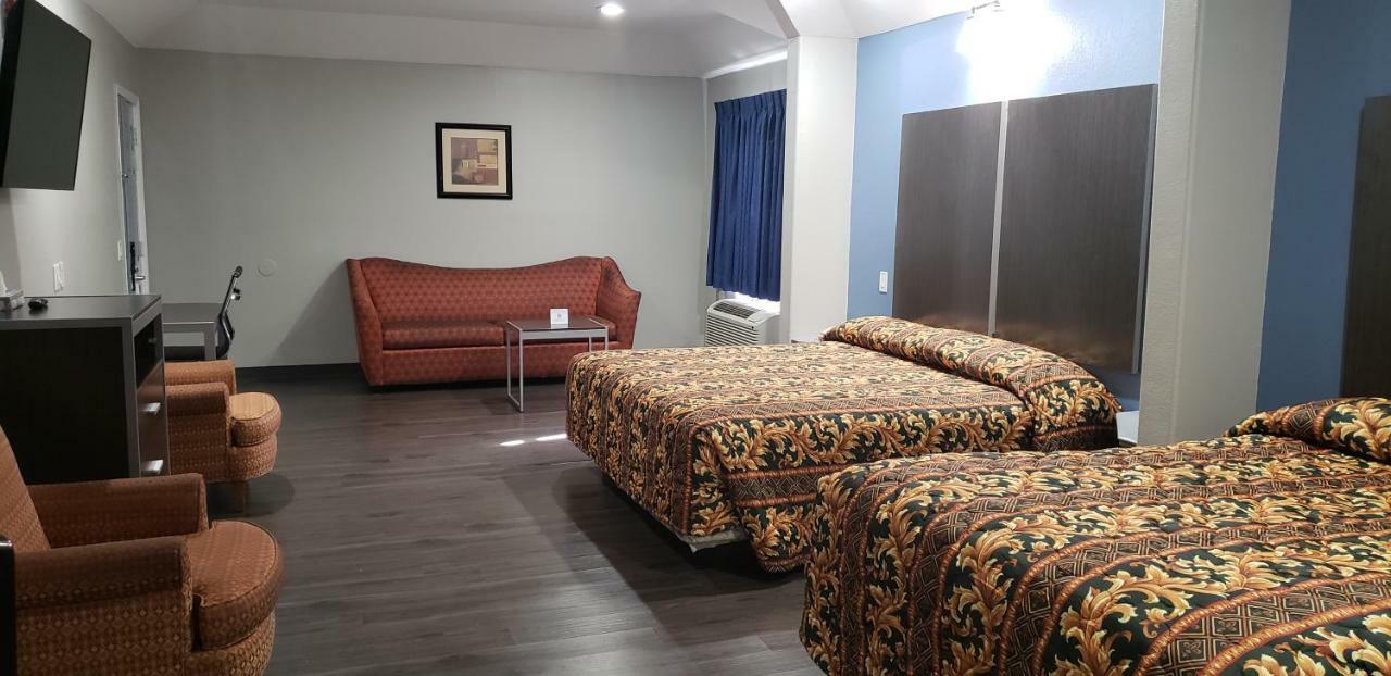 Camelot Inn & Suites Хьюстон Экстерьер фото